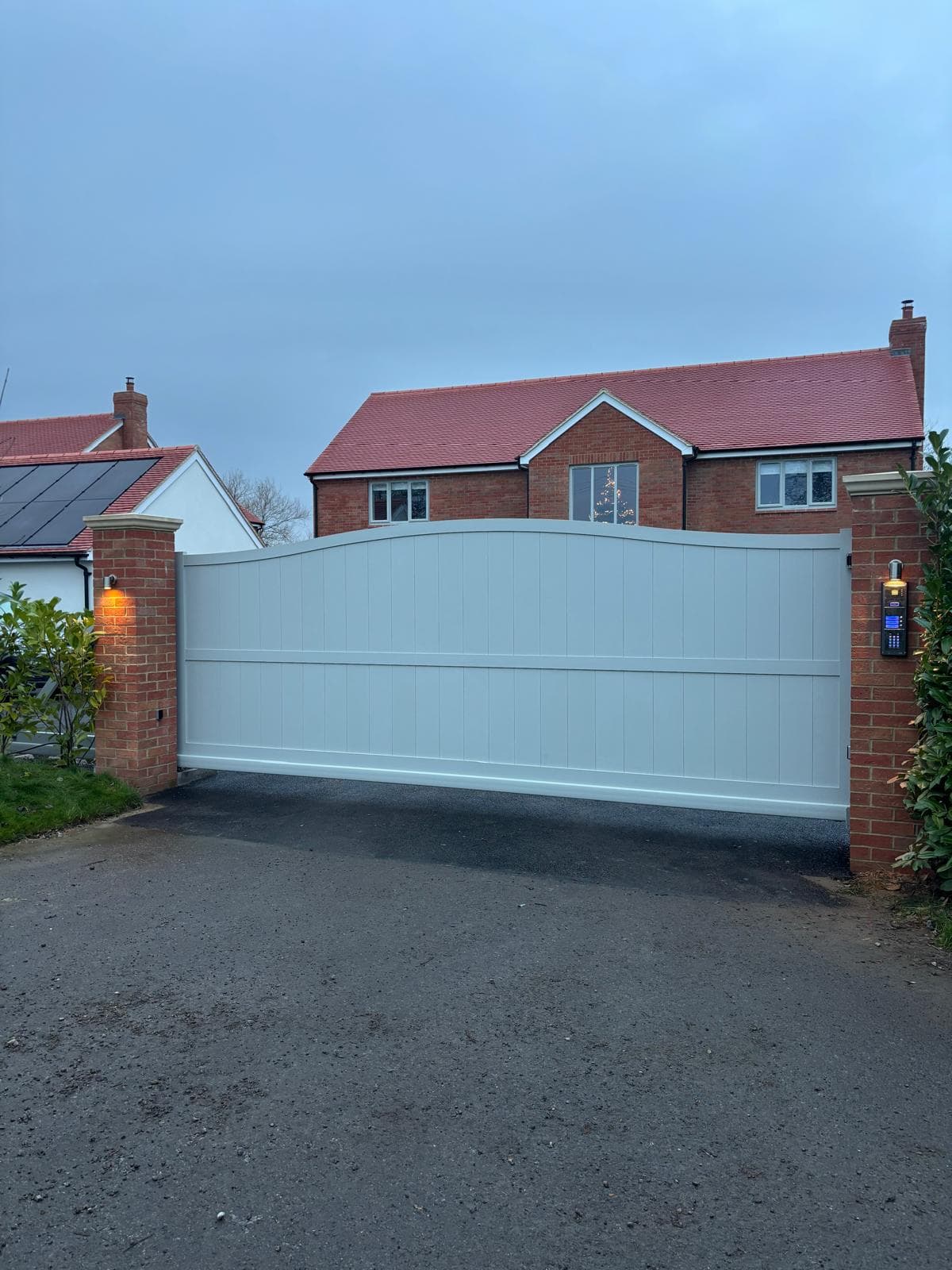 white automatic swing gates