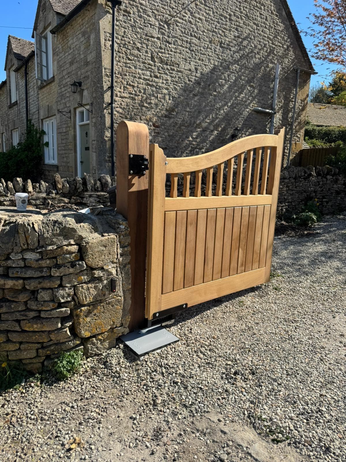 custom gates on a hill — installation by Complete Gate Automation